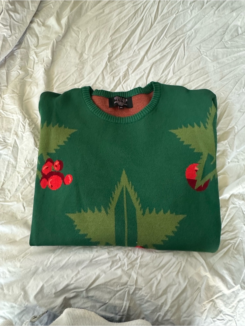Jeffree Star Green Crewneck Sweater with Red Accent Motifs